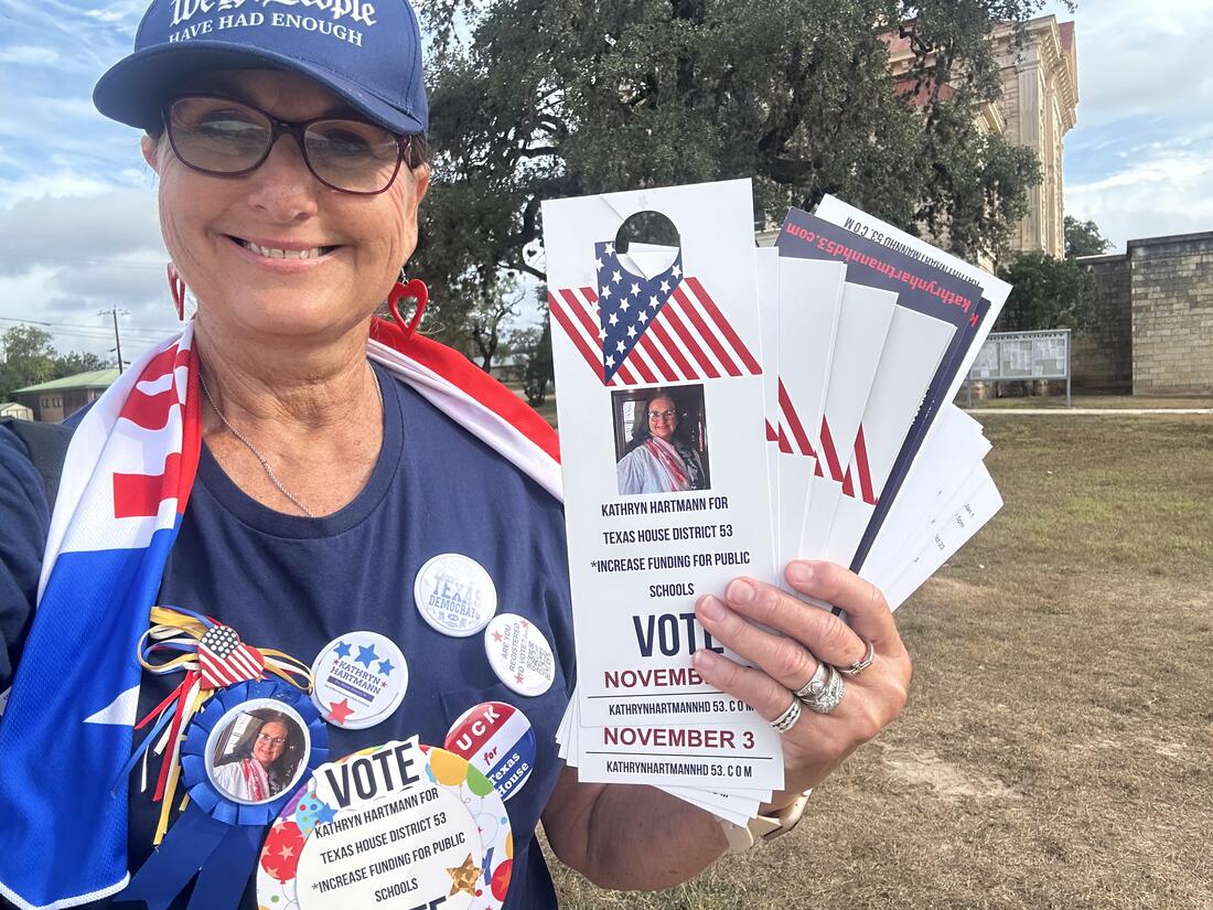 Kathryn with her door hangers